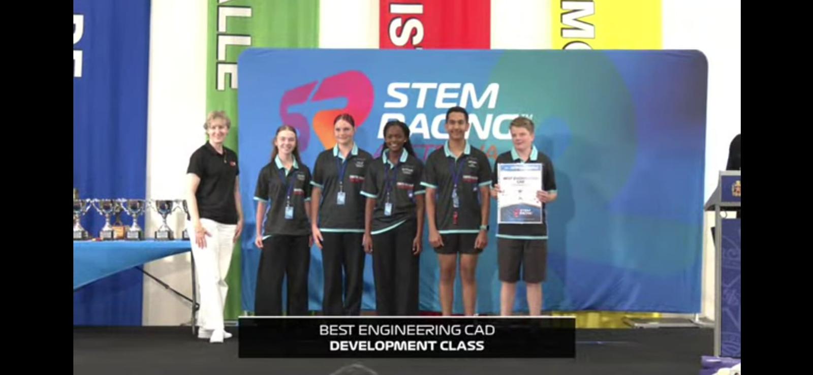 Quantum Racing accepting Best Engineering CAD in Development Class